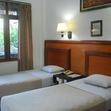 Hotel Sorga Cottages Кута Номер фото
