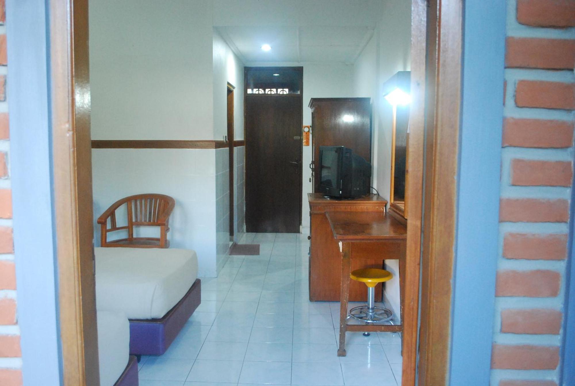 Hotel Sorga Cottages Кута Номер фото